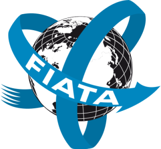FIATA logo. Black and white world globe with blue arrows wrapped around. White 'FIATA' text on blue arrow. 
